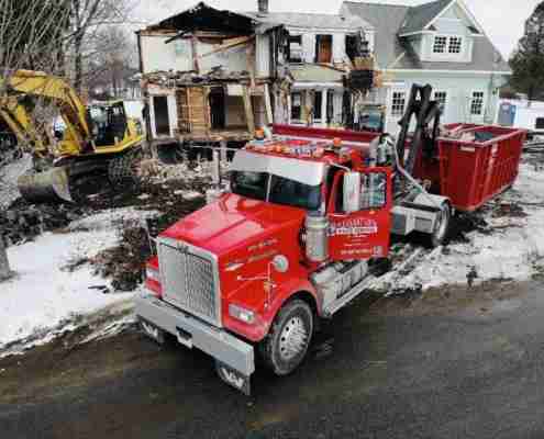 House Demolition with Pleasant View truck - dumpster rentals for demolition sites. Renting a dumpster in the winter.